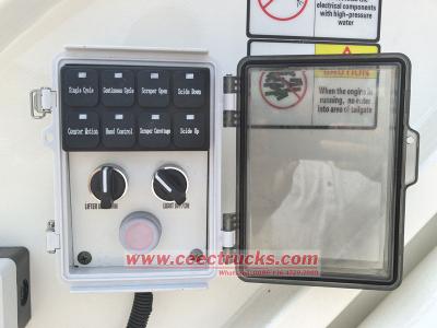 Isuzu ELF rear loader garbage truck